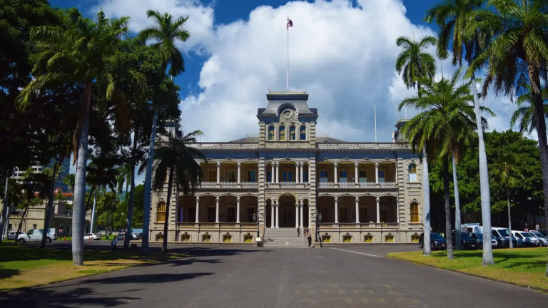 enoatours pearl harbor remembered from ko olina historic building palm trees blue sky
