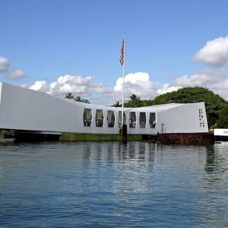 enoatours salute to pearl harbor from waikiki uss arizona memorial waterfront flag
