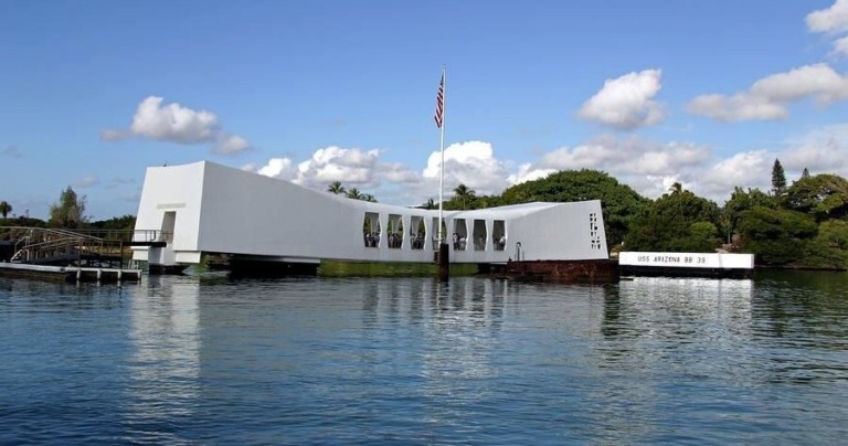 enoatours salute to pearl harbor from waikiki uss arizona memorial waterfront flag