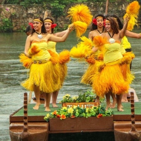 ht pht oahu polynesian cultural center and pearl har hula dancers yellow costumes boat
