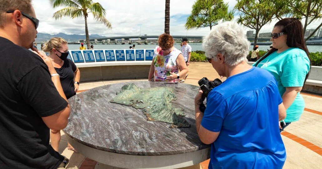 ht pht oahu polynesian cultural center and pearl har tourists interacting map waterfront